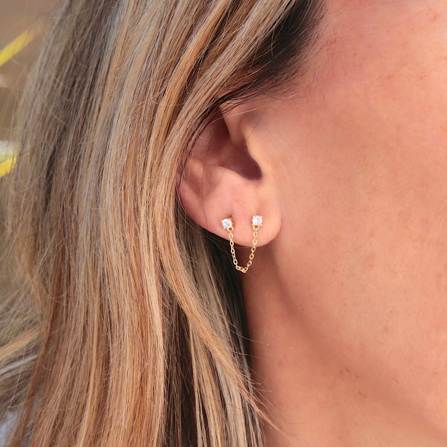 Puces d'oreilles femme deux trous avec chaine doré ou argent