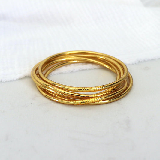 Bracelet jonc bouddhiste doré femme, jonc fin vendu à l'unité
