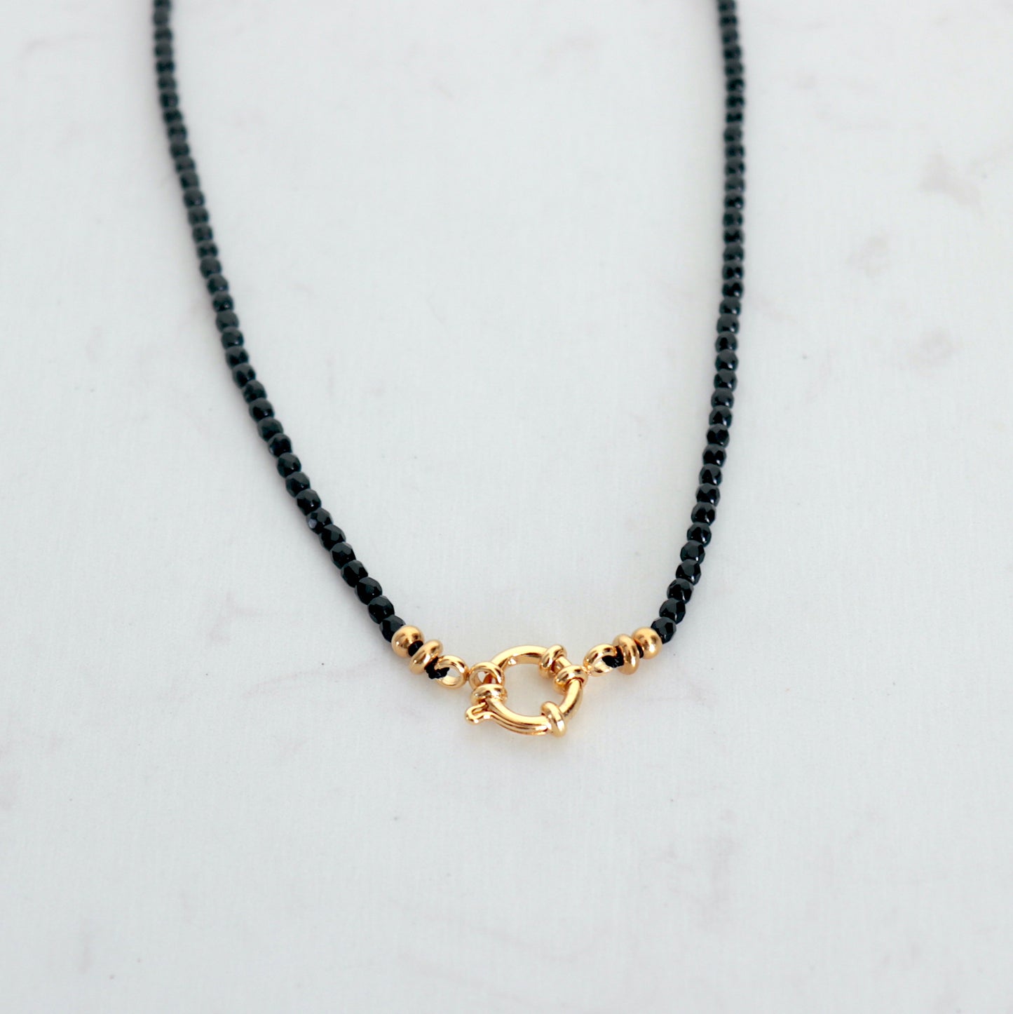 collier acier inoxydable perles fermoir bouée et perles noires
