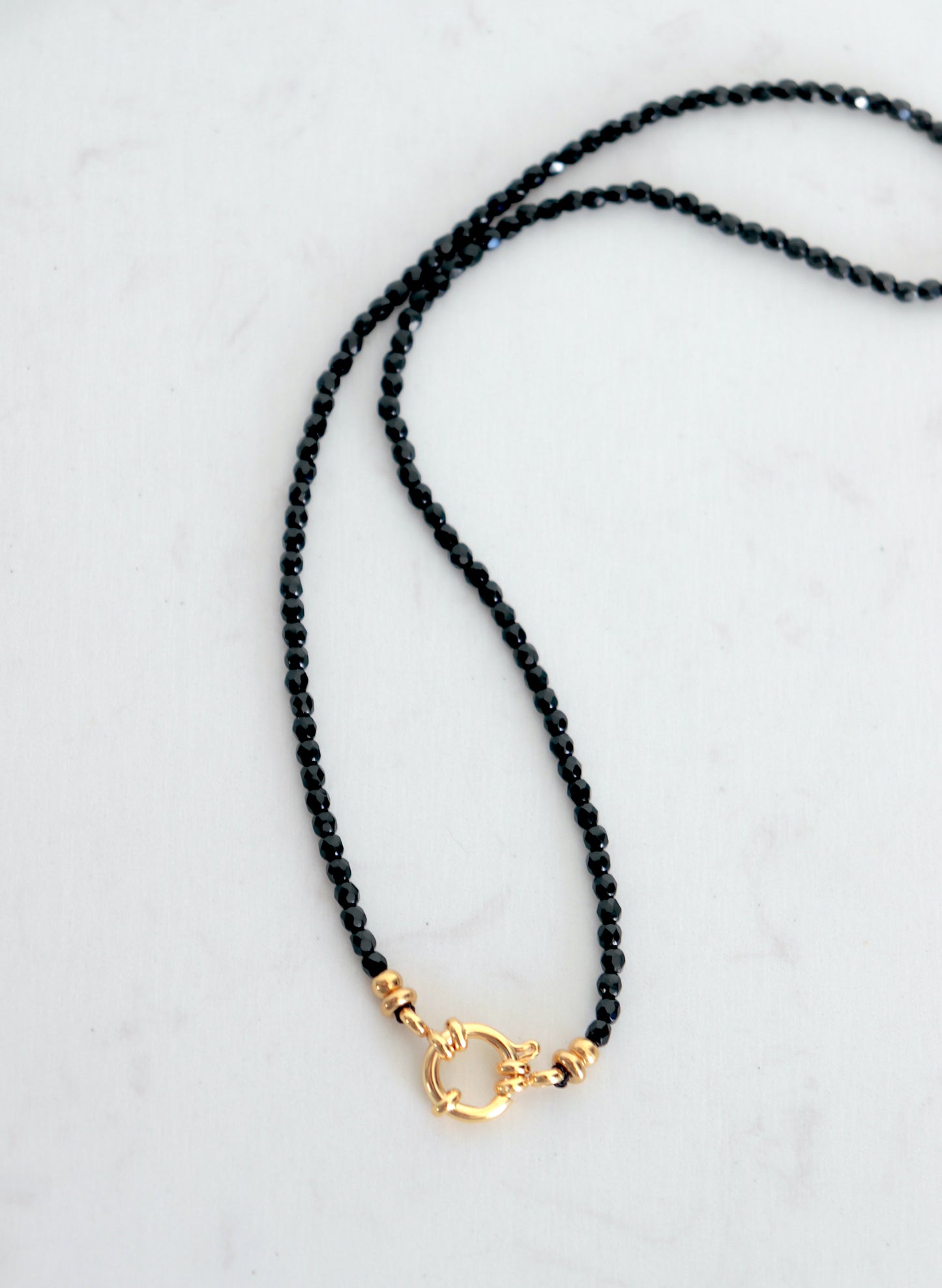 collier acier inoxydable perles fermoir bouée et perles noires