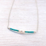 Ras de cou pierres turquoise rondes et perle d'eau douce femme