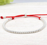 Bracelet cordon perles rondes argent pour femme
