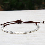 il y a un bracelet cordon couleur à choisir associé à des perles et des tubes en argent 925 pour femme