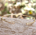 Bracelet jonc plaqué or et pierres de zirconium