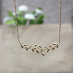 collier femme plaqué or feuille de laurier